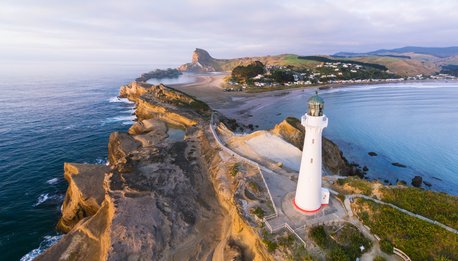 Overhead view of Castlepoint lighthouse with Castlepoint village in background